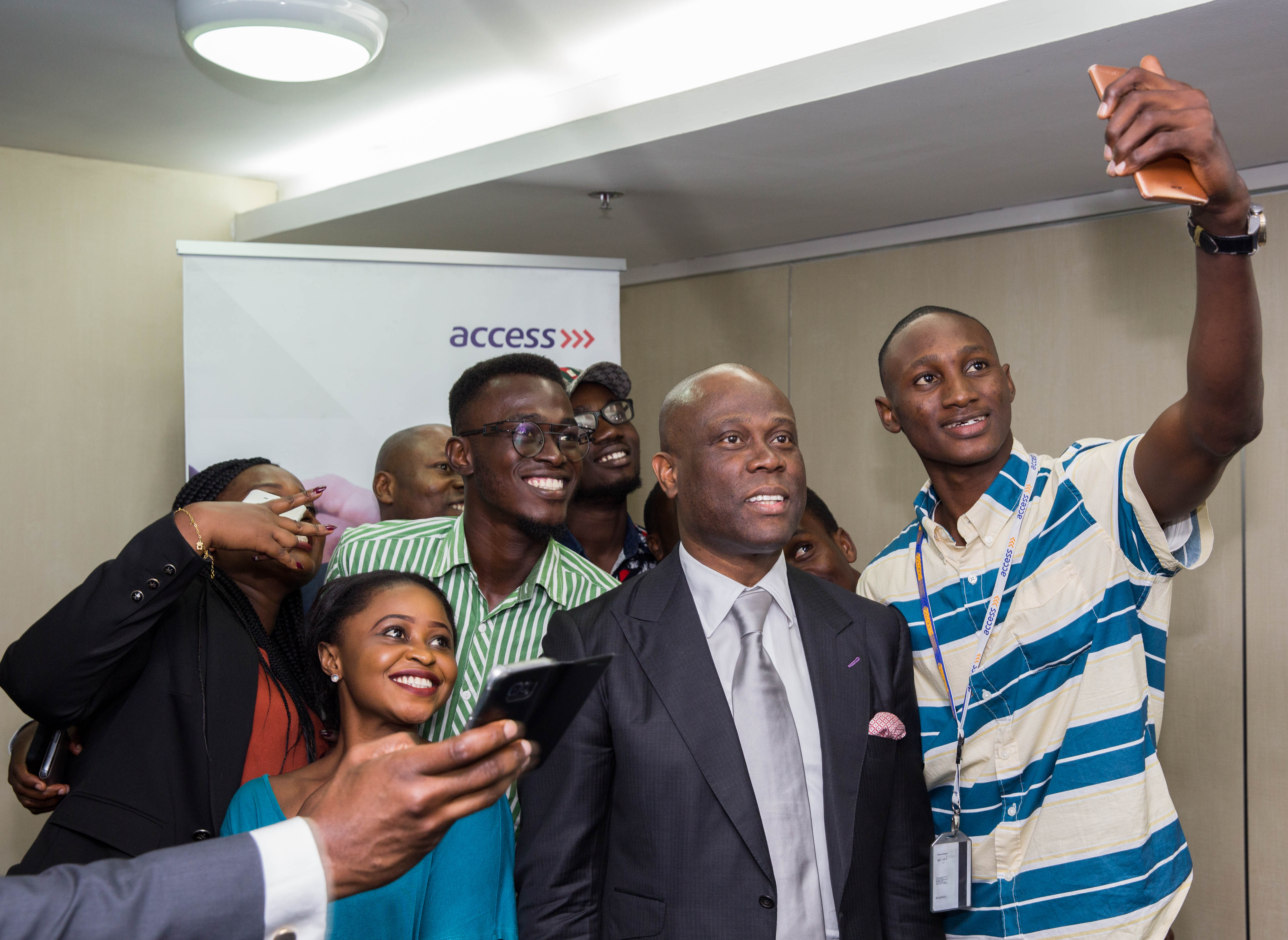 Access Bank GMD selfie with Unilag Delegates at the event